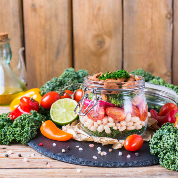 istock Healthy vegan salad in a mason jar with beans 921345638