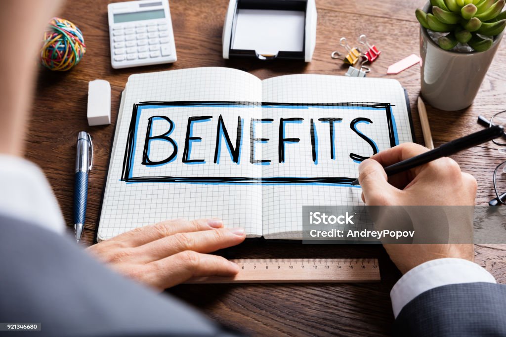 Social Man Drawing Social Security Benefits Social Man Drawing Social Security Benefits In Notepad Benefits Stock Photo