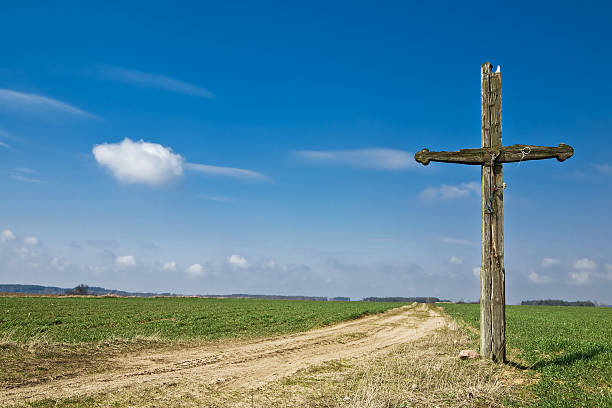 istock Old cross standing on the side of a road 92134725