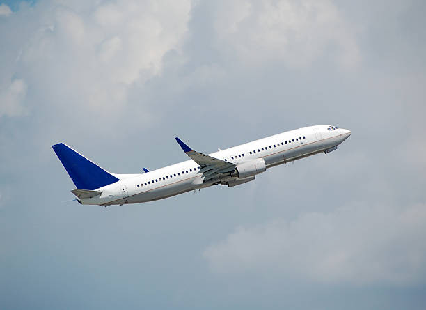 Boeing 737 jet takeoff stock photo
