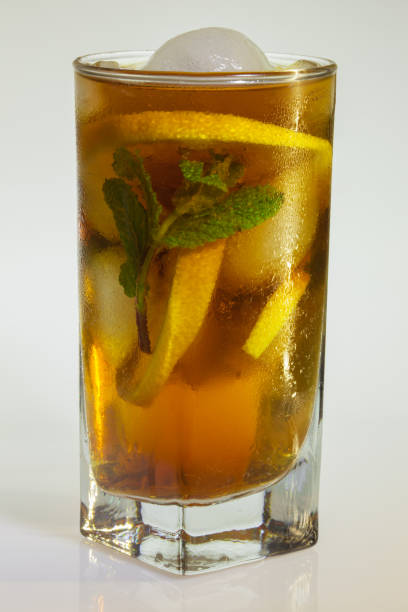 istock Glass of cold drink isolated on white background 921350324