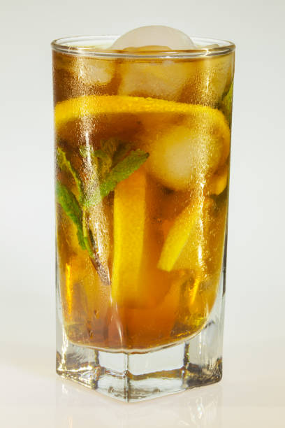 istock Glass of cold drink isolated on white background 921350392