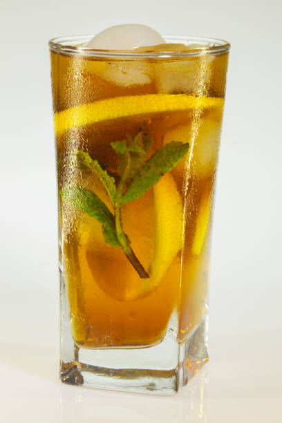 istock Glass of cold drink isolated on white background 921350464