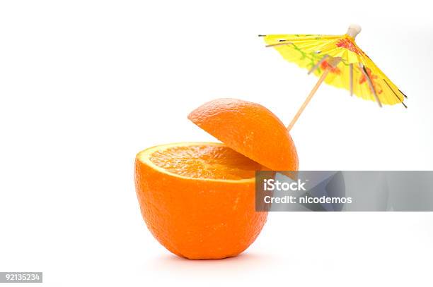 Natural Orange Cocktail Stock Photo - Download Image Now - Umbrella, Cocktail, Drink Umbrella