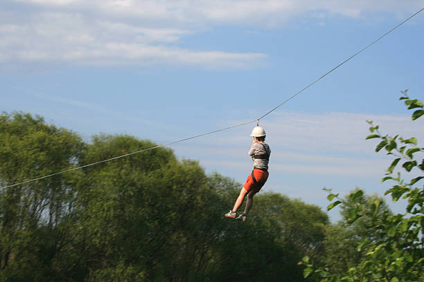 istock Woman on a zip line 92135292