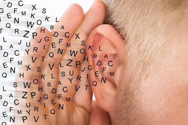 istock Person Trying To Hear With Hand Over Ear 921352924