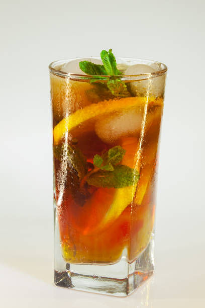 istock Glass of cold drink isolated on white background 921353290
