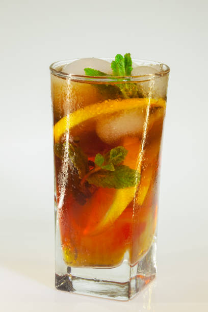 istock Glass of cold drink isolated on white background 921353414
