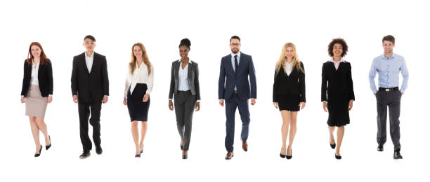 istock Businesspeople Walking On White Background 921353642