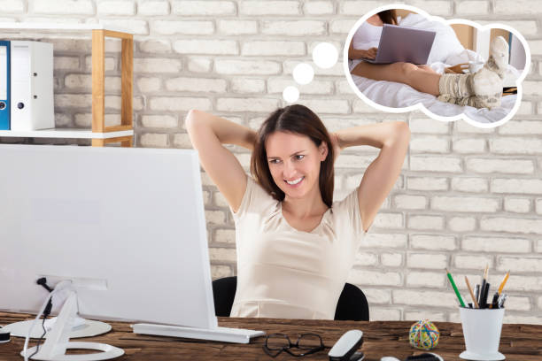 istock Businesswoman Stretching Her Arms In Office 921353780