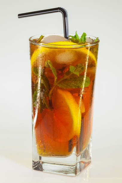 istock Glass of cold drink isolated on white background 921353806