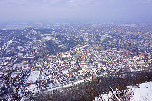 Panoramic view of downtown  of Brasov, Romania with a snowy day