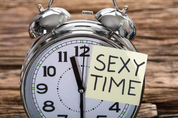 istock Word Sexy Time Sticky Note On Retro Alarm Clock 921356672