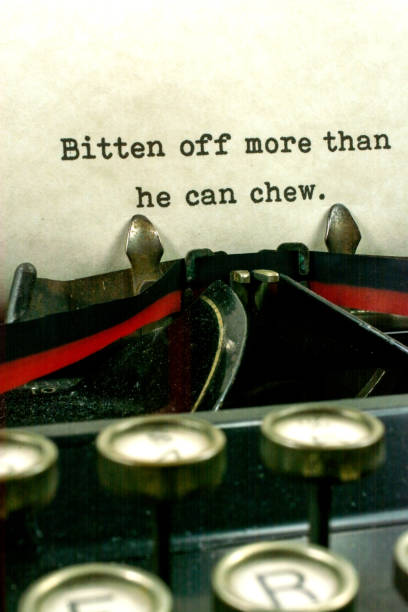 istock Antique typewriter with saying more can chew 921371018