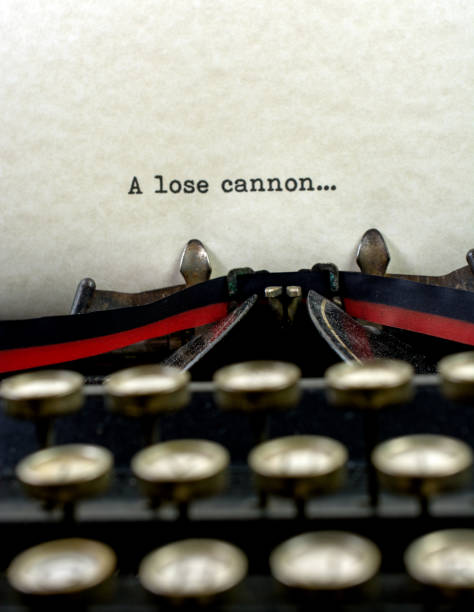 istock Antique typewriter with saying a lose cannon 921371344