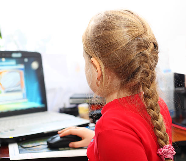 istock Girl mouse laptop 92137160