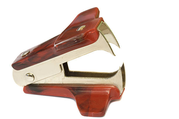 istock Deep red staple remover isolated on white background 92137405