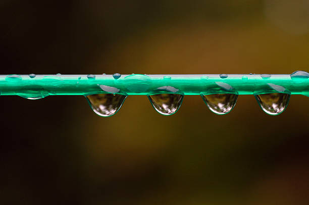 Raindrops on clothes line stock photo