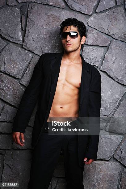 Stone Wall Fashion Male Stock Photo - Download Image Now - Adult, Adults Only, Beautiful People