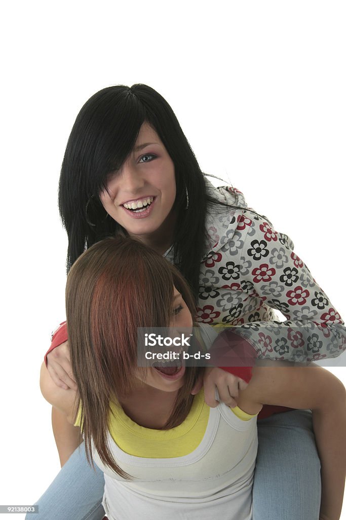 Foto de estudio de dos elegantes teen girls - Foto de stock de A la moda libre de derechos