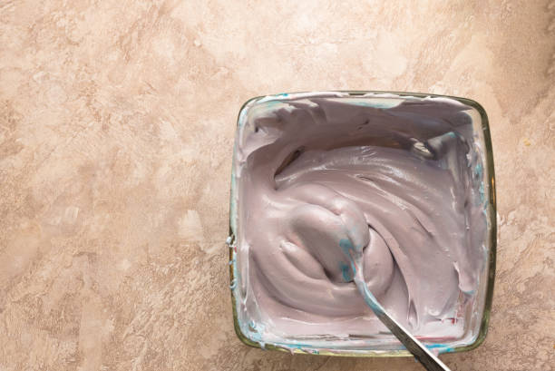istock The cream meringues in a glass container 921382642