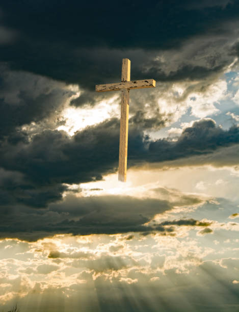 istock Good Friday crucifix under dark sky with copy space 921392318