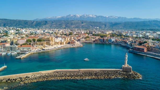 istock Chania Crete Old Harbor and City with mountain view 921417606