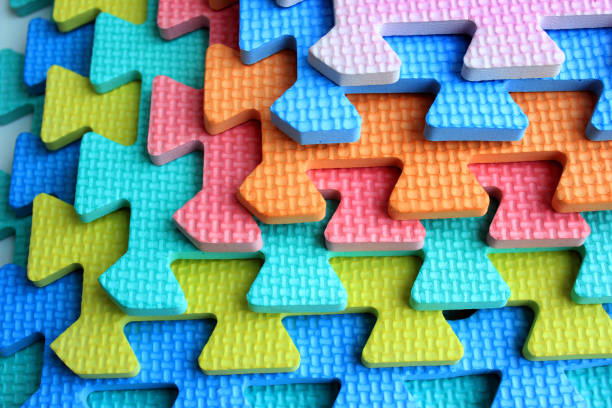 istock Children plastic cutout jigsaw puzzle pieces 921419704