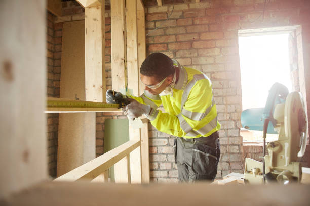 male carpenter with chopsaw - tape measure home improvement measuring wood imagens e fotografias de stock