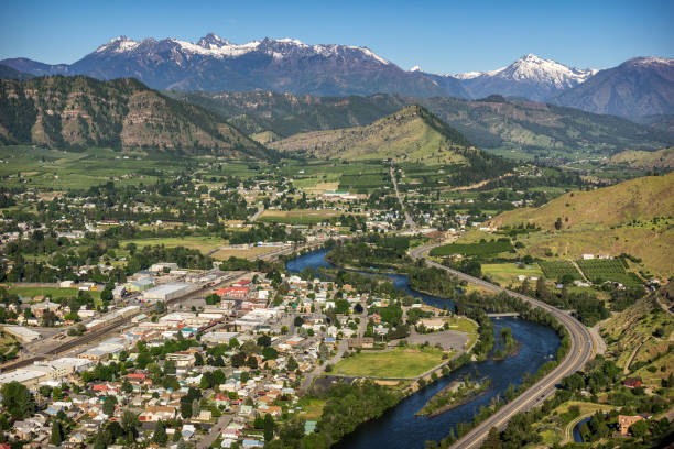 Cashmere Washington Scenic Spring View View overlooking Cashmere Washington with the Enchantments and Mt. Cashmere in the background cashmere stock pictures, royalty-free photos & images