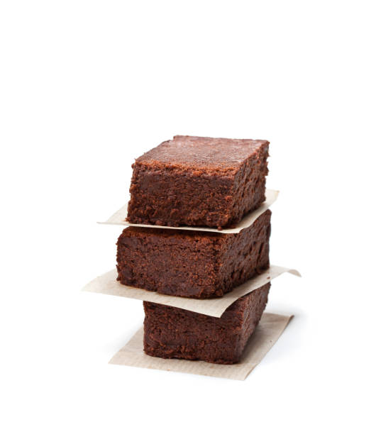 istock Chocolate  brownie pieces isolated on white 921446206