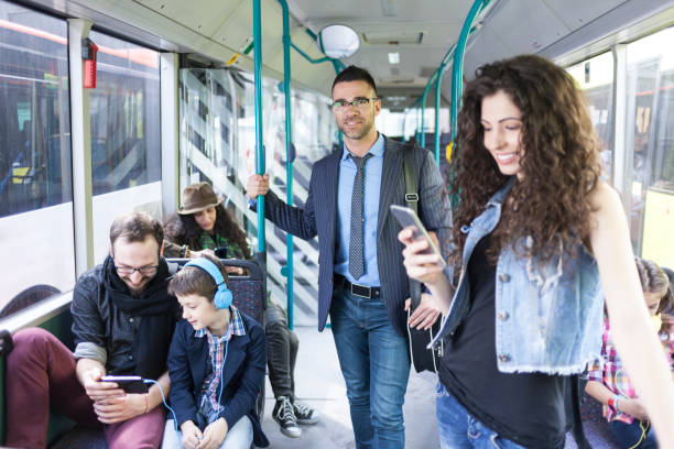 istock Woman using smart phone inside of a bus 921448638