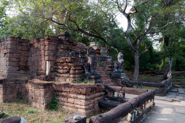 istock Stone lions guarding steps at the 12th century Preah Khan temple complex 921459392