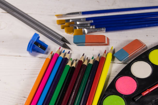 istock Set of drawing tools on white wooden background 921472334