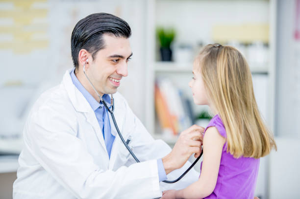 istock Checking A Girl's Heart Rate 921474930