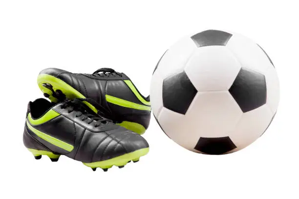 Soccer boot and ball isolated over white background