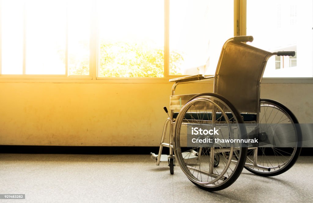 Wheelchairs waiting for patient services. Wheelchairs waiting for patient services.Wheelchairs in the hospital. Wheelchair Stock Photo