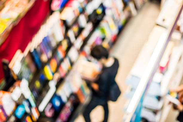 istock blurred people in book fair, chiangmai Thailand 921488780