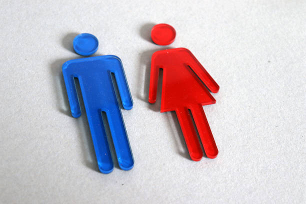 青い男性と赤雌記号。 - group sex ストックフォトと画像