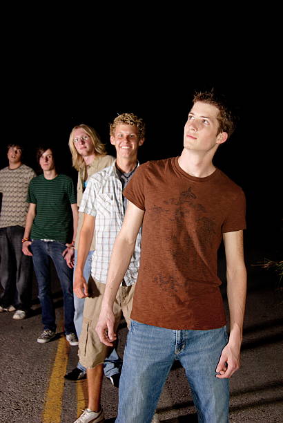 istock teen rock band on road 92151624