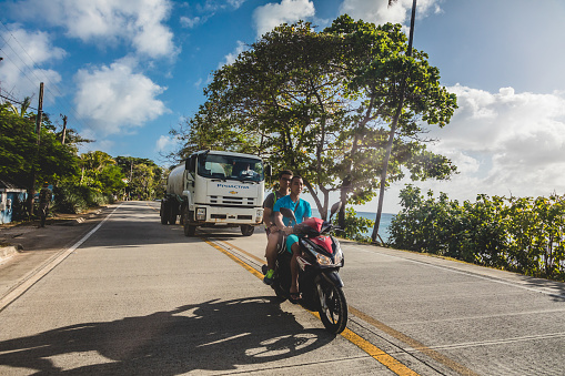 SAN ANDRES ISLAND, Colombia _ Circa March 2017. Motorcycle on the Highway. In San Andres There is a Road that do the Round Trip All Around the Island. All kind of Vehicles use this Route