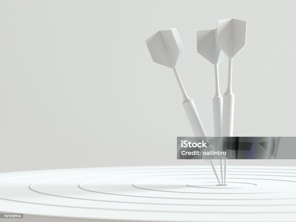 Darts hitting in the target center with copy space for your text Darts hitting in the target center with copy space for your text, Minimal concept, 3d render. Aspirations Stock Photo