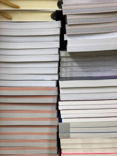 istock stacks of books on shelf, school shop 921519002