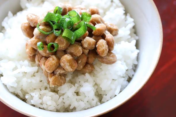 Traditional Japanese Fermented Soybeans On Freshly Cooked Rice stock photo