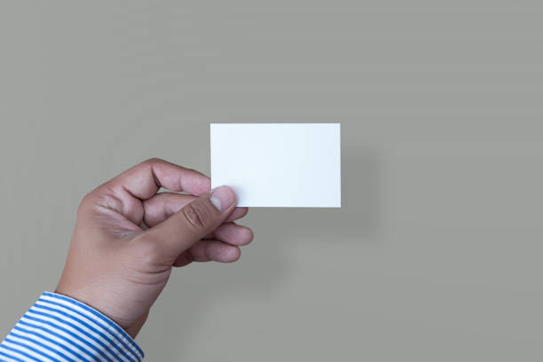 istock Hand hold blank white card mockup Business branding. 921532810