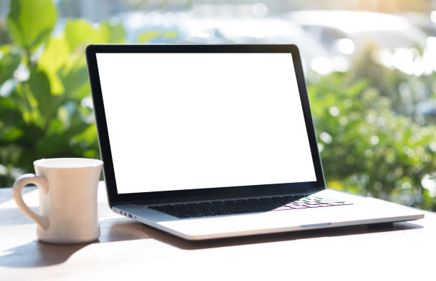 istock Laptop with blank screen on table. Workspace background new project on laptop computer with blank copy space screen for your advertising text message 921532852