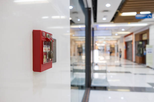 istock Fire alarm on the wall of shopping mall warning and security system 921532854