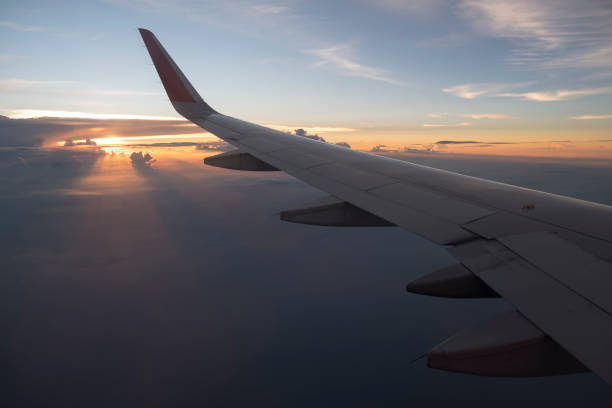 istock View of twilight sunset sky from airplane window in evening 921535986