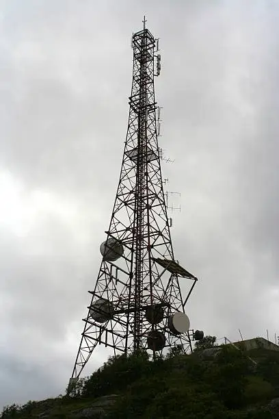 a radiomast seen against the sky