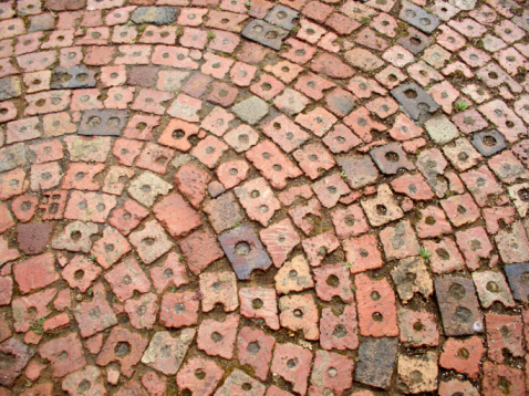 Circular pattern made from half bricks.
